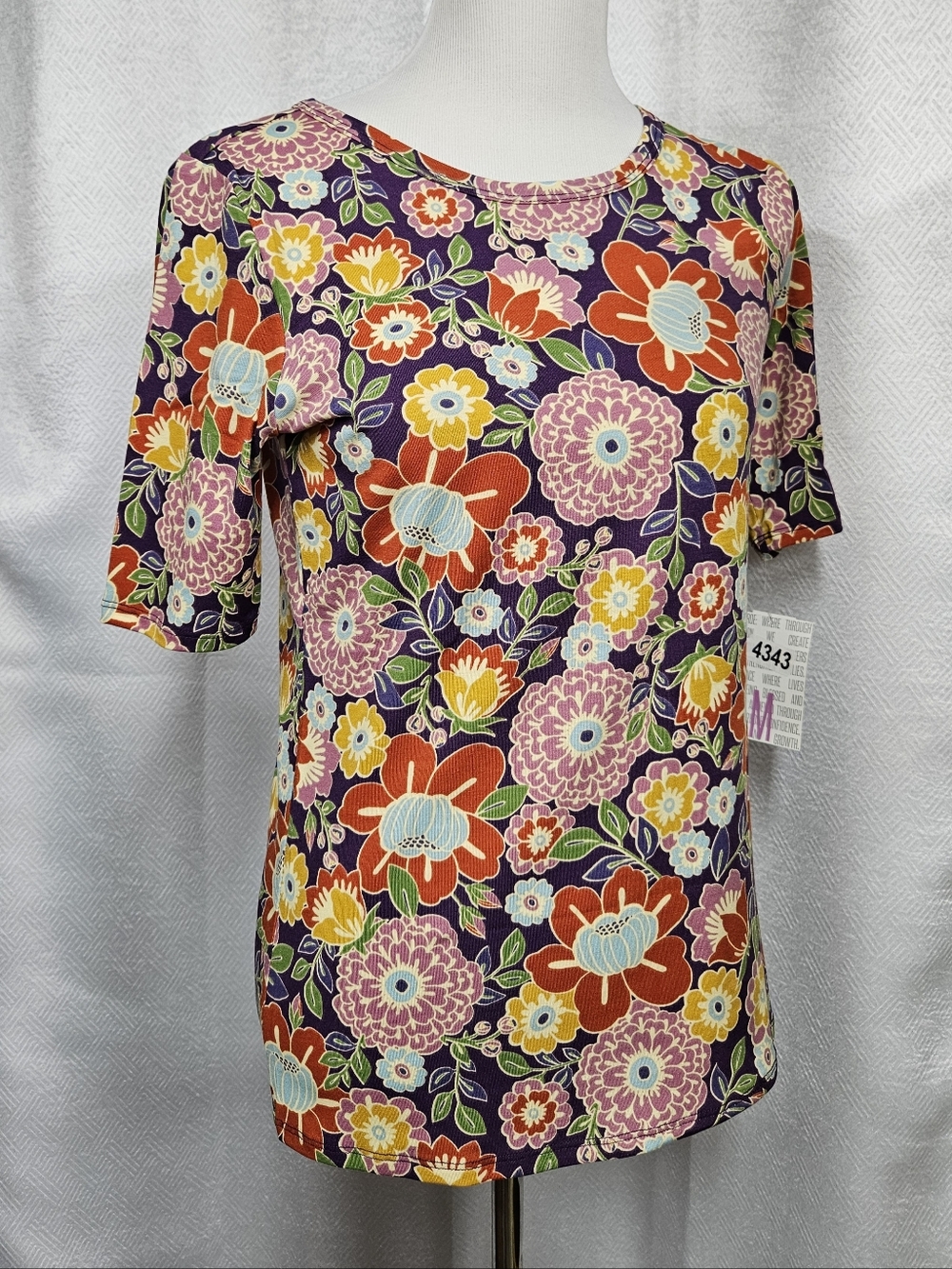 LuLaRoe Gigi Size Medium Floral Short Sleeve Tee in Purple and Multicolor